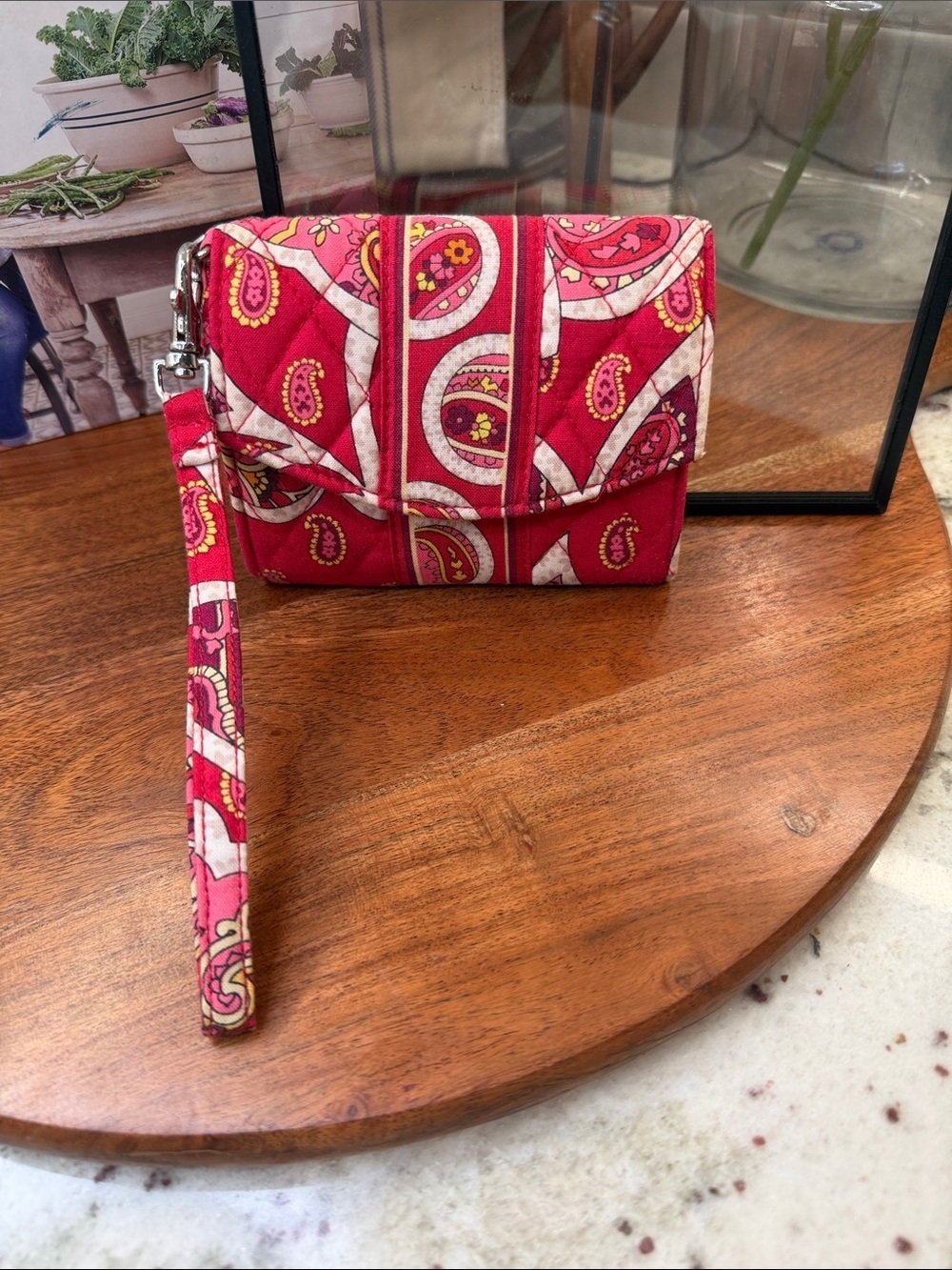 Vera Bradley phone wristlet in the retired Rosy Posies quilted pattern.